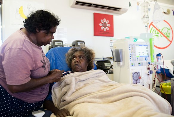 Dadu Corey chats with her friend, Alma Robertson, as she has dialysis in the Purple House unit in Yuendumu.