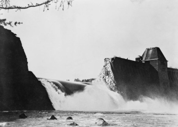 Water pours from the Mohre Dam six hours after the successful attack.