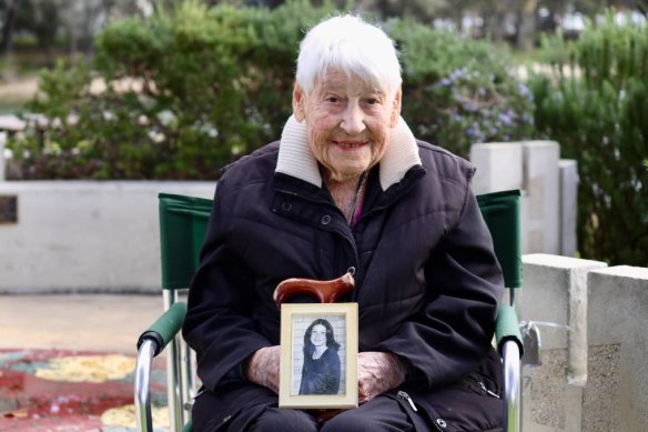 Jean Eaton with a photo of her daughter.