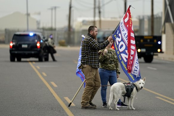 Supporters of President Donald Trump arrive to a rally in Phoenix. 