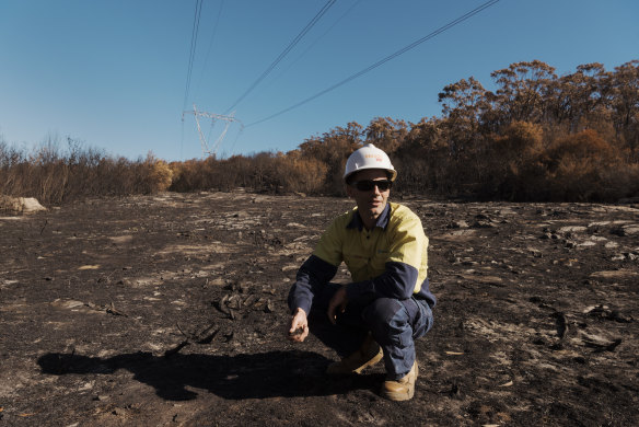 Transgrid worker Joshua Barker in Menai, where bushfires threatened power transmission infrastructure earlier this month.