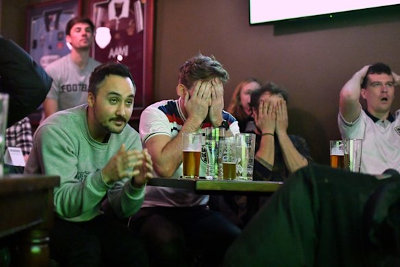 English soccer fans gather at Turf Sports Bar in Melbourne in the early hours of the morning to watch the Euro 2020 final between England and Italy being played at Wembley Stadium in London.