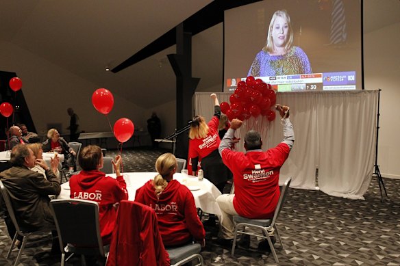 Volunteers cheer at the Labor election party for division of Paterson NSW, at Maitland City Bowls in Rutherfod. 