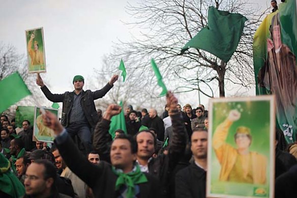 Supporters of Libyan leader Colonel Muammar Gaddafi gather in Hyde Park, London.
