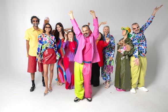 Sydney designer Gary Bigeni with designers before his Australian Fashion Week show.