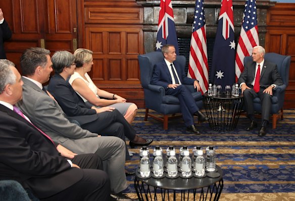 U.S. Vice President Mike Pence, right, meets with the Australian opposition leader Bill Shorten, second right, in Sydney.