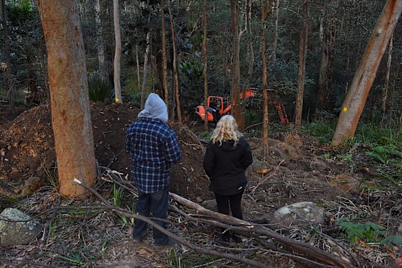 The parents of Matthew Leveson, Mark (left) and Faye (right) at the site in the Royal National Park at Waterfall.