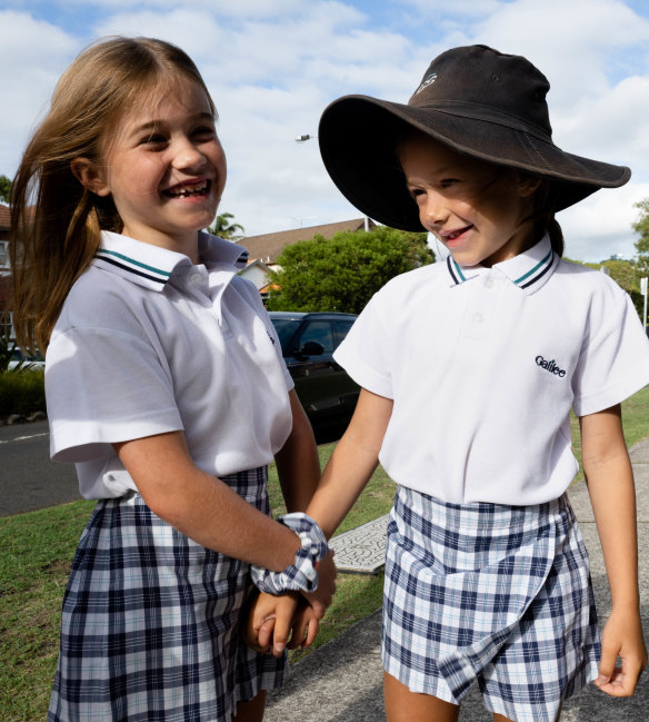 Eva Boyd and Madeline Pires, both 6, walk to Galilee Catholic Primary School in Bondi Beach. 