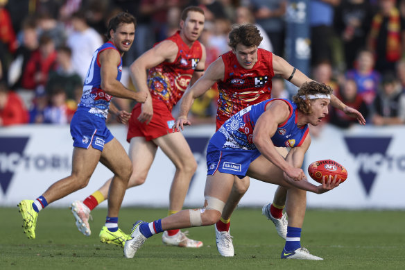 Aaron Naughton booted three goals in the first half but was held goalless by Sam Collins after half-time on Saturday.