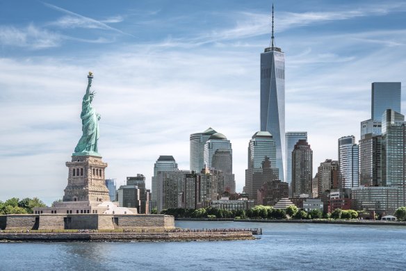 The Statue of Liberty with One World Trade Centre in the background.