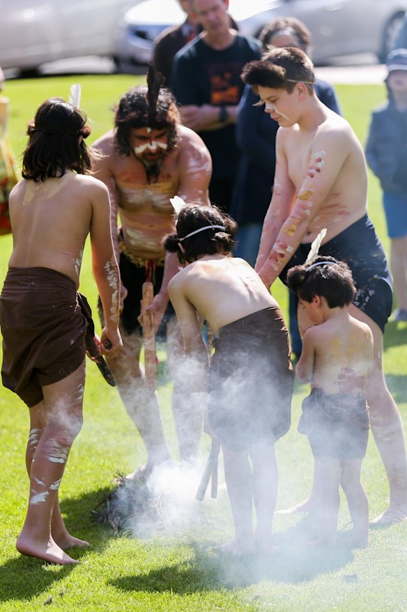 Indigenous people performing a ceremony as part of an Adani Coal Mine protest at Civic Green in Warrnambool, Vic.