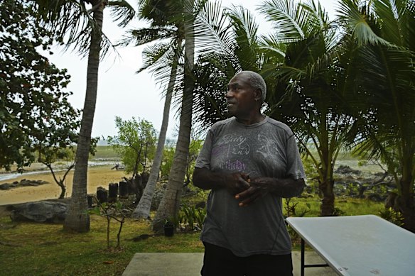 Stanley Cook in his garden on the shoreline on Thursday Island. Stanley has not yet recieved his COVID-19 vaccination. 