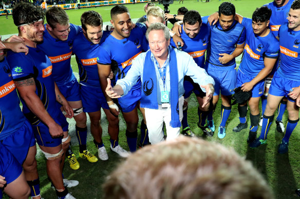 Andrew 'Twiggy' Forrest celebrates with the Force after the match.
