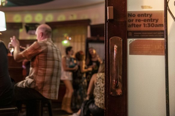 A sign spelling out the old lockout rules at the Hollywood Hotel in Surry Hills.
