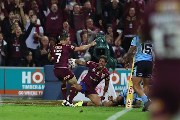 Cooper Cronk and Dane Gagai of the Maroons celebrate Dane Gagai scoring a try
