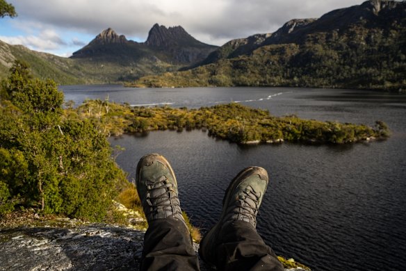 CRADLE MOUNTAIN: Nothing says 'stretch your legs' quite like the climb to the top of Tasmania's most famous mountain. There are several approaches to the 1545-metre peak, be it along the Overland Track from Ronny Creek, around Wombat Pool or across the Face Track, but all converge near the Kitchen Hut day shelter at the foot of Cradle's imposing cliffs. From here, flexibility is about as key as a good pair of boots, as the track ascends through a large boulder field and then funnels through the cliffs to the rock-strewn summit. Cradle Mountain is the fifth-highest peak in Tasmania, and the view from its summit takes in three of the four taller mountains: Barn Bluff, Pelion West and Mt Ossa.