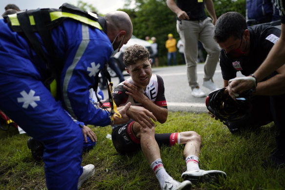 Switzerland’s Marc Hirschi gets medical assistance after crashing during the first stage of the Tour de France.