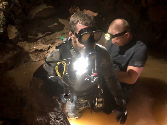 Australian Federal Police specialist response group divers assisting in transporting of supplies in Tham Luang cave Khun Nam- Nang Norm National Park, Chiang Rai District,Northern Thailand. 