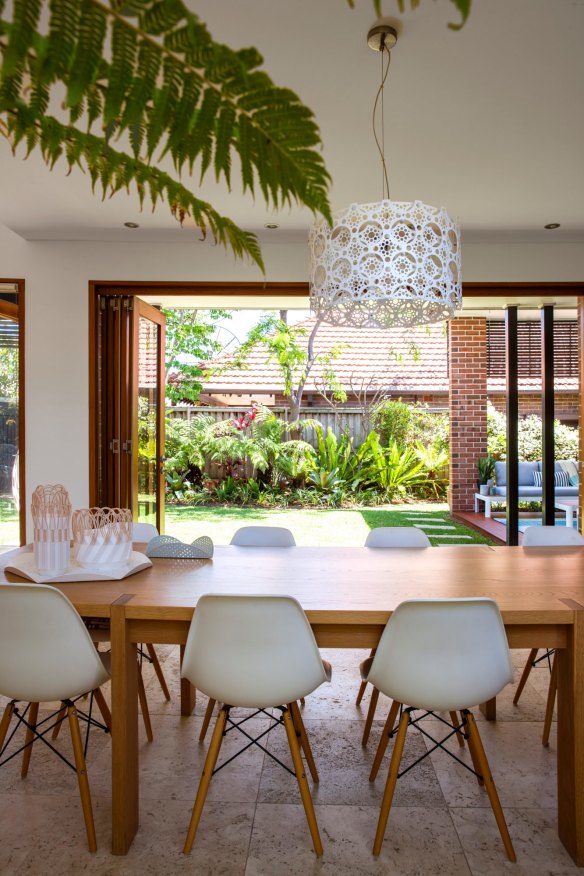 “I designed the table and designer Gary Galego made it,” says Rina, who has taught some of Australia’s leading industrial designers. The “Lace” light above the table is by bernabeifreeman.