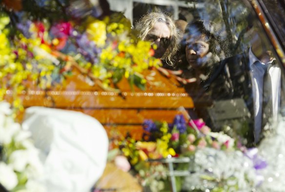 Guests outside the church after the funeral of Myuran Sukumaran.