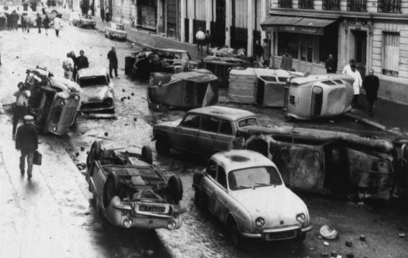“A dozen overturned and burned cars litter the Rue Gay-Lussac where students had set up barricades last night in the middle of the Latin Quarter. ” May 11, 1968.
