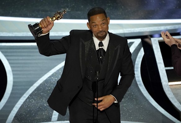 Will Smith accepts the award for best performance by an actor in a leading role for "King Richard".