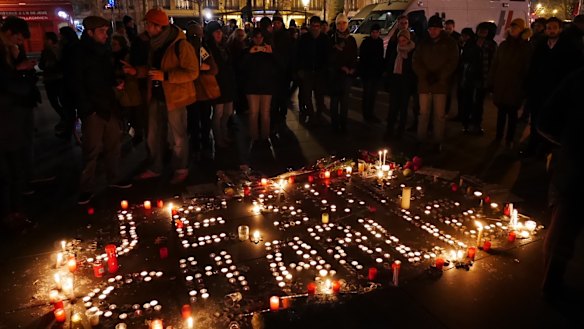 Candles were lit in memory of those slain.