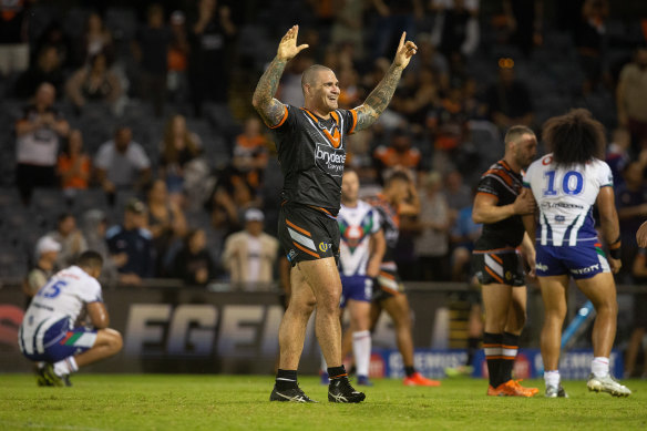 Russell Packer shows his delight at the Tigers performance as the final whistle blows. 