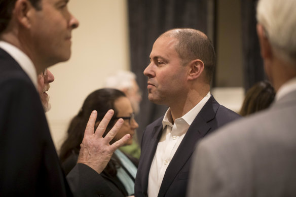 Oliver Yates (left) and Treasurer Josh Frydenberg at a Kooyong candidates forum during the election.