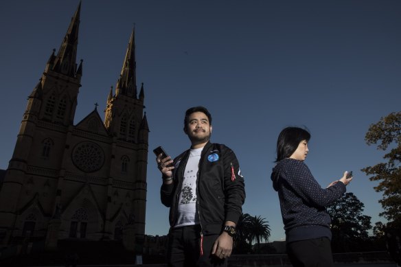 Pokemon GO player Nelson Cheng and researcher Kathleen Yin at St Mary’s Cathederal in Sydney’s CBD.


