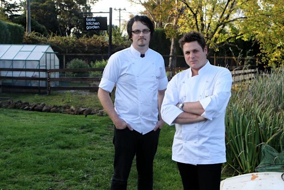 Pictured left is head chef Shaun Quade and chef and director of Biota, James Viles standing in front of the glasshouse and kitchen garden.