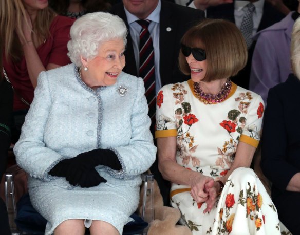 Famous front row ... Queen Elizabeth II sits next to fashion editor Anna Wintour at London Fashion Week last month.