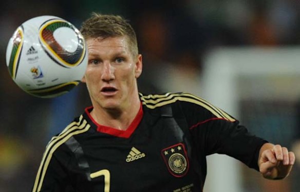 Germany's midfielder Bastian Schweinsteiger eyes the ball.