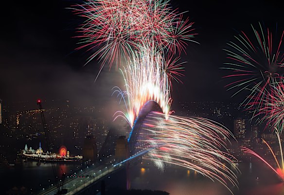 At midnight, a colourful display with bursts of neon, pastel and spinning fireworks blast into the sky to a soundtrack created by electronic music duo The Presets.
