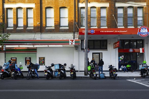 Food delivery bikes are virtually the only traffic seen during the midst of lockdown restrictions in the usually bustling streets of Newtown in March.