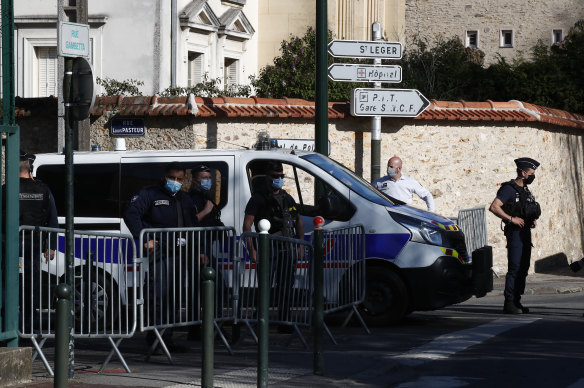 Police stand guard as President Emmanuel Macron said France had again been the victim of a terror attack.