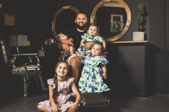 Casper Aniversario with his four daughters (from left) Eva, 6, Acacia, 2-months, and twins Gigi and Franki, 16-months.