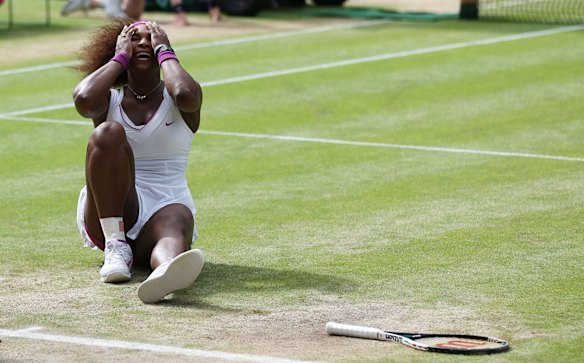 2012 Wimbledon - Serena Williams of the USA celebrates match point against Agnieszka Radwanska of Poland.