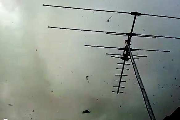 A witness captures debris shooting up into the air on his phone. Photo: YouTube
