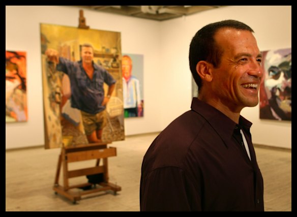 Artist Michael Mucci wins the Archibald Packing Room Prize for his painting of builder and television personality Scott Cam.