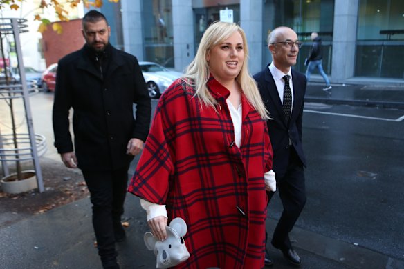 Rebel wears tartan: Rebel Wilson appears outside court.