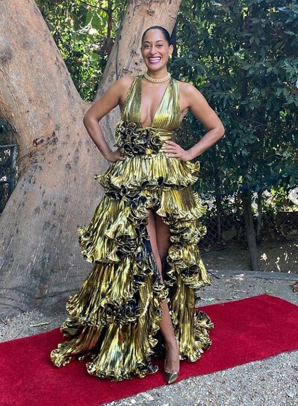 Tracee Ellis Ross wears a Alexandre Vauthier gown, Tiffany and Co jewels and Jimmy Choo shoes.