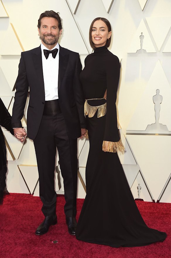 Bradley Cooper, left, and Irina Shayk arrive at the Oscars at the Dolby Theatre in Los Angeles.