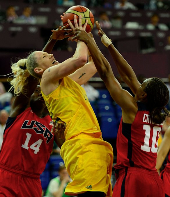 A fierce competitor, Lauren Jackson goes for the ball against Tina Charles and Tamika Catchings of the US in the 2012 Olympics semi-final.