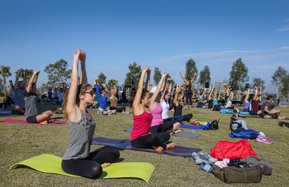 People attending a yoga class at the opening of Barangaroo Reserve to the general public.