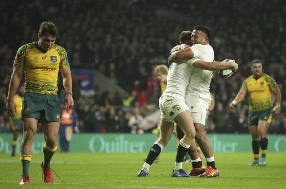 England's Owen Farrell celebrates with Manu Tuilagi.