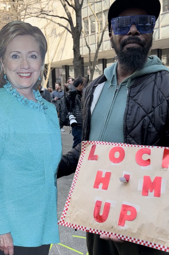 Gregory Williams, with a Hillary Clinton cut-out, in Manhattan ahead of Trump’s arraignment.