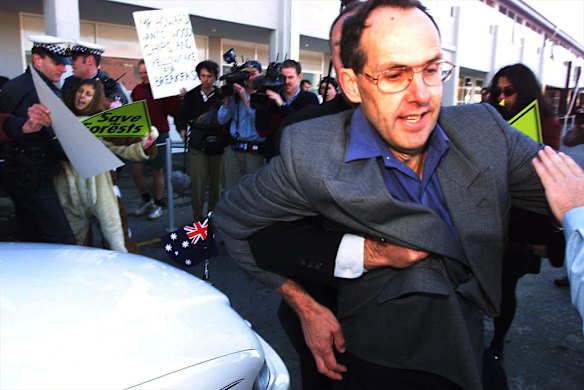 Bob Brown is removed by security as John Howard arrives at a Liberal Party election breakfast, Hobart, September 1998.