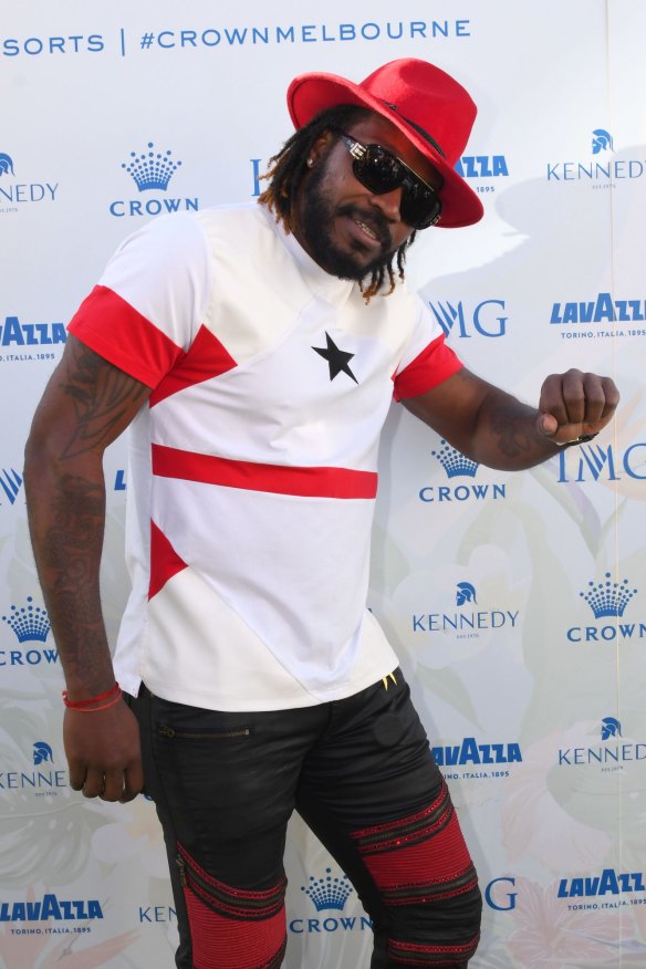 Cricketer Chris Gayle arrives at the party.