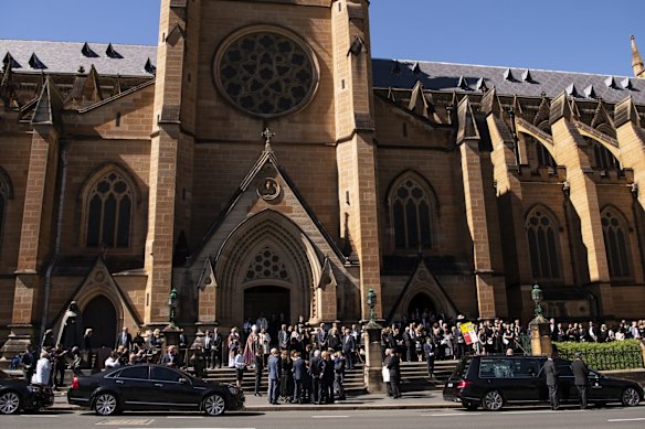 Friends and family outside the steps of St. Mary's Cathedral.
